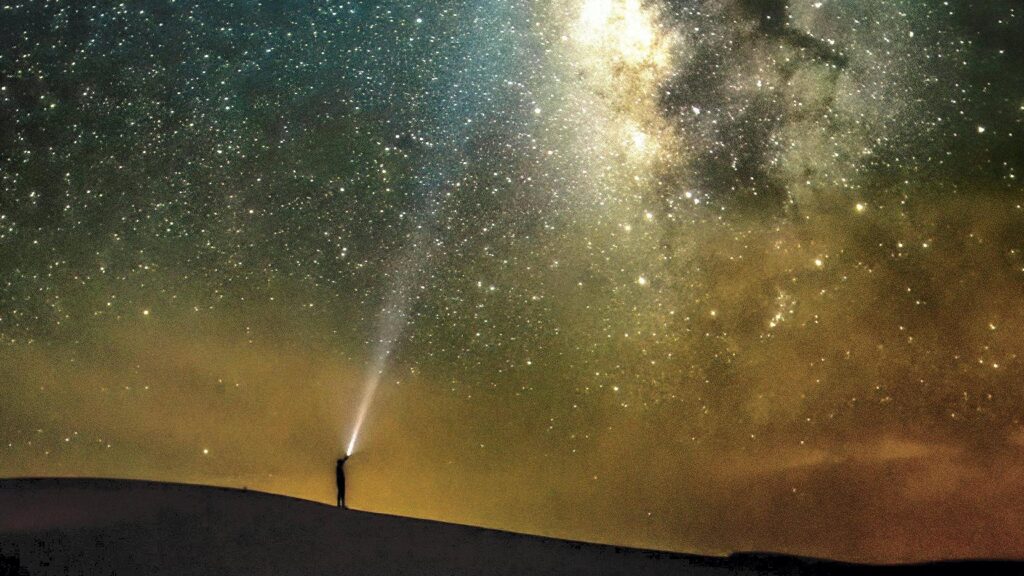 Emirates Desert Safari Dubai – Magical Stargazing Experience. › Forever Tourism LLC Stargazing in the desert night sky during Emirates Desert Safari Dubai.
