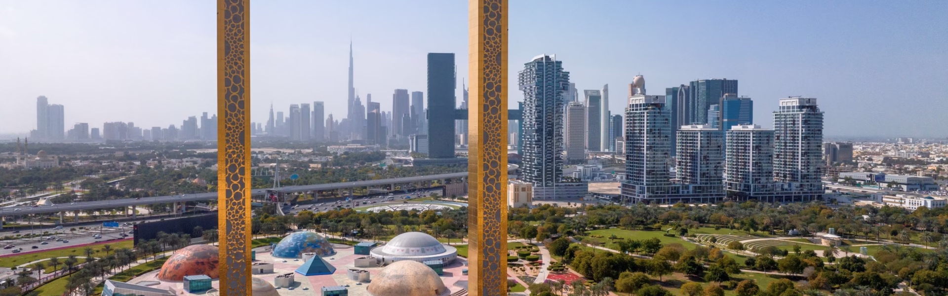 Panoramic view of the Dubai Frame during daylight, showcasing the landmark's architecture with details on Dubai Frame ticket, timings, and best visiting hours.
