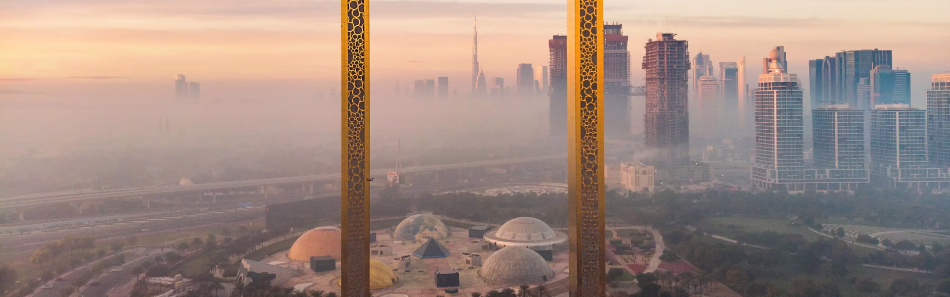 View of the iconic Dubai Frame at sunset, a top attraction with Dubai Frame tickets offering stunning skyline views and unique experiences.
