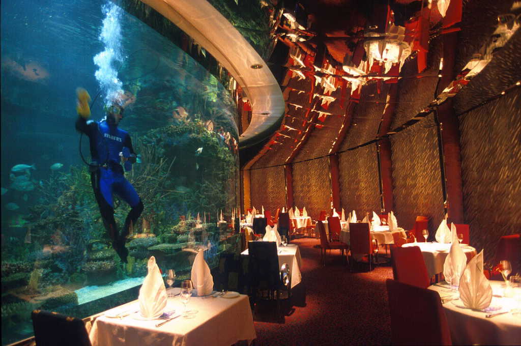 Panoramic view of Burj Al Arab, one of the best hotels in Dubai, showcasing its iconic architecture and luxurious interiors.