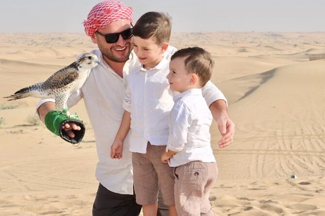 Tourists enjoying a thrilling private desert safari Dubai with dune bashing and scenic views of the Dubai Desert Safari landscape.