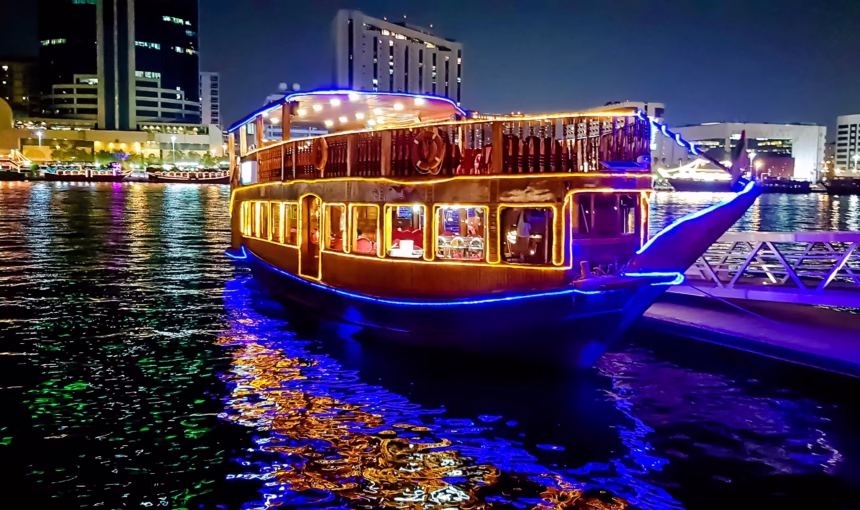 Dhow Cruise Dinner Marina | 3 Views You’ll Talk About #WorthIt › Forever Tourism LLC Traditional dhow at Marina during sunset offering a unique dhow cruise dinner Marina with buffet and waterfront views.