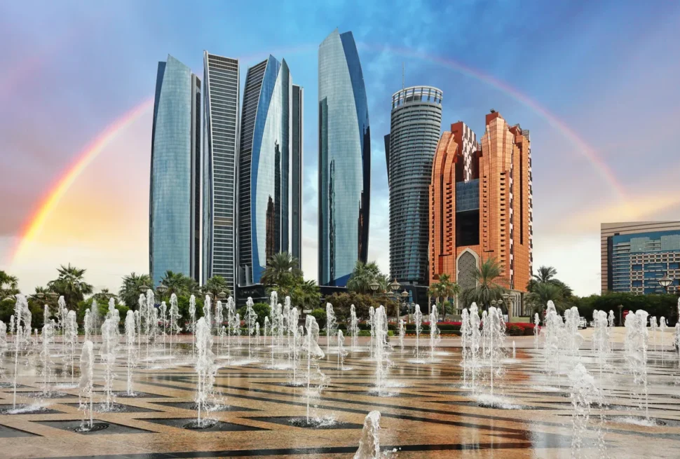 Tourists enjoying tours and day trips throughout Abu Dhabi on a desert safari with Forever Tourism guide.