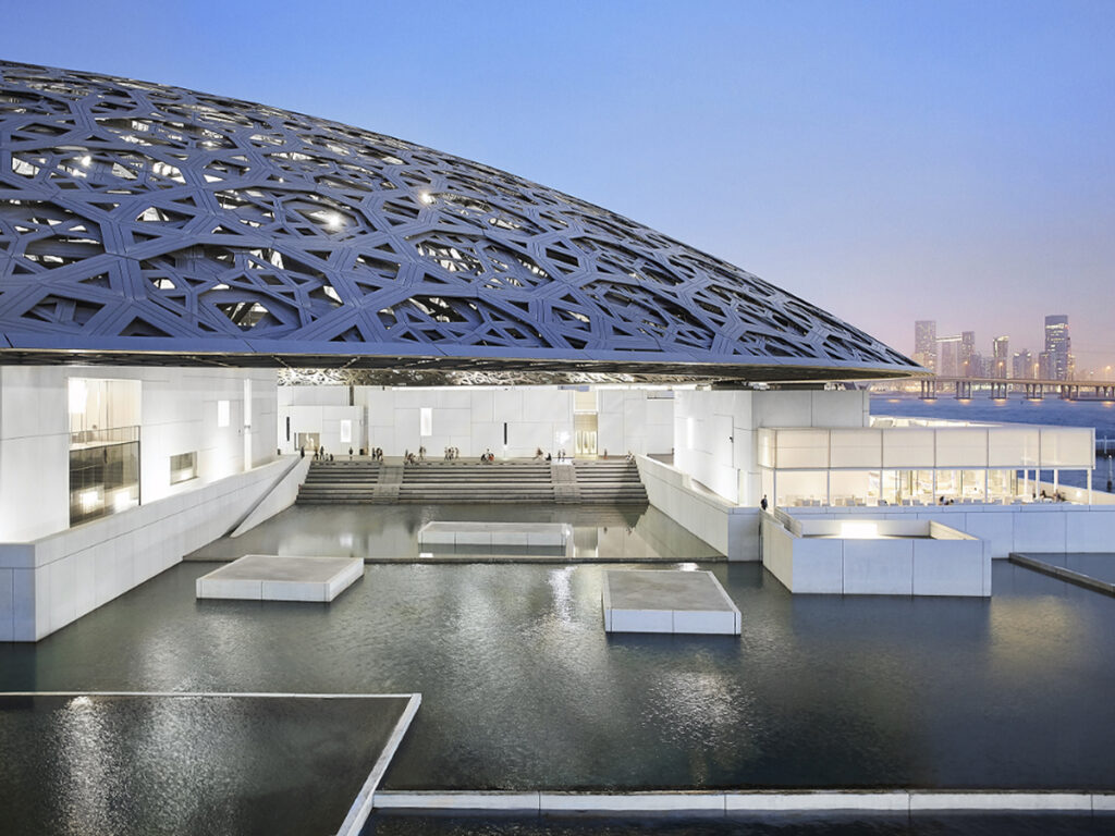 The Top 10 Tours and Day Trips Throughout Abu Dhabi › Forever Tourism LLC Tourists enjoying tours and day trips throughout Abu Dhabi on a desert safari with Forever Tourism guide.