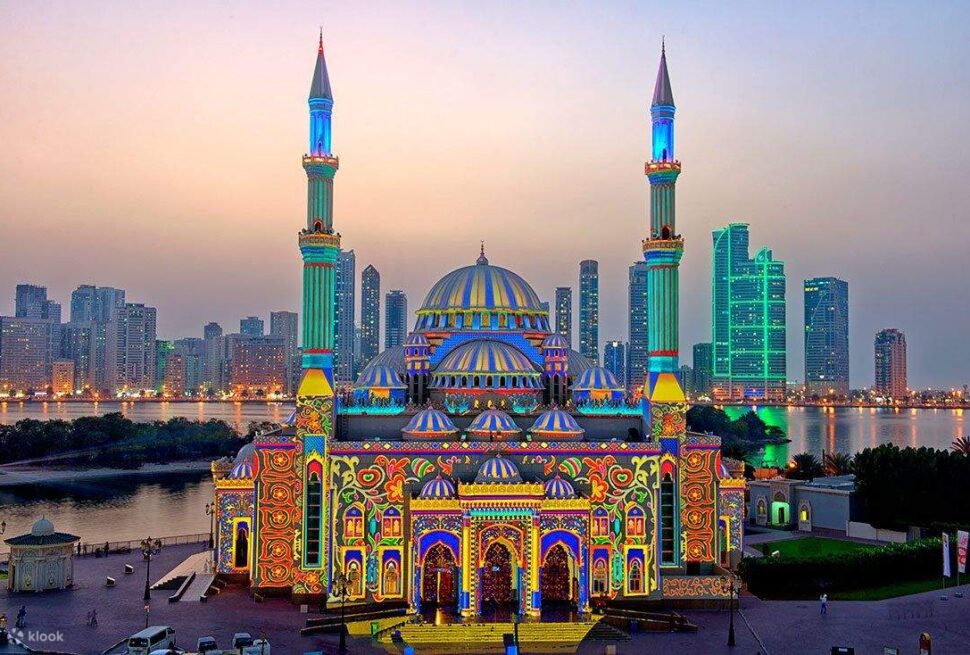 Tourists exploring cultural landmarks during a Sharjah City Tour, capturing the essence of sharjah sightseeing on a guided city tour Sharjah experience.