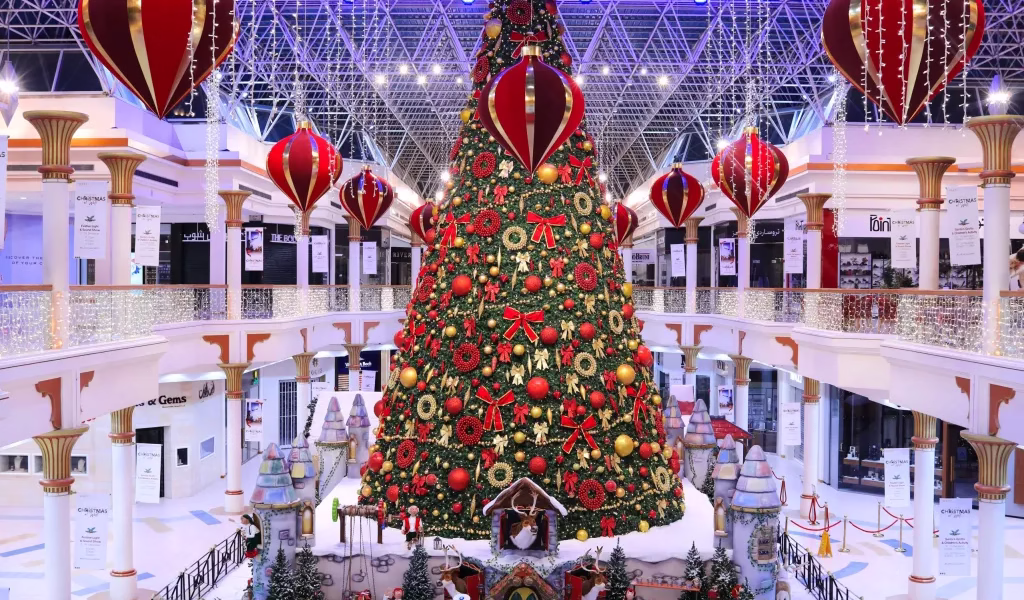 Festive decorations and lights at a Dubai Christmas market, showcasing holiday shopping and events during a Christmas holiday in Dubai 2025.