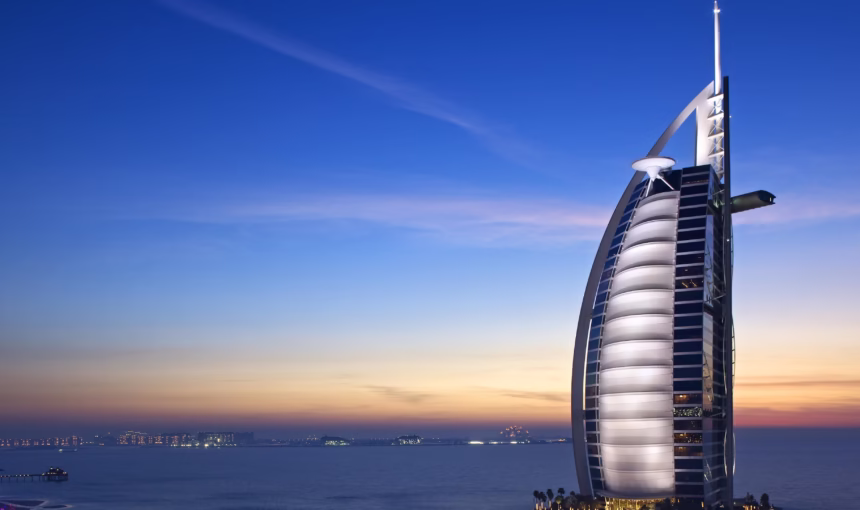 Burj Al Arab | Entry Secrets Revealed | #InsideLuxury › Forever Tourism LLC Panoramic view of Burj Al Arab, one of the best hotels in Dubai, showcasing its iconic architecture and luxurious interiors.