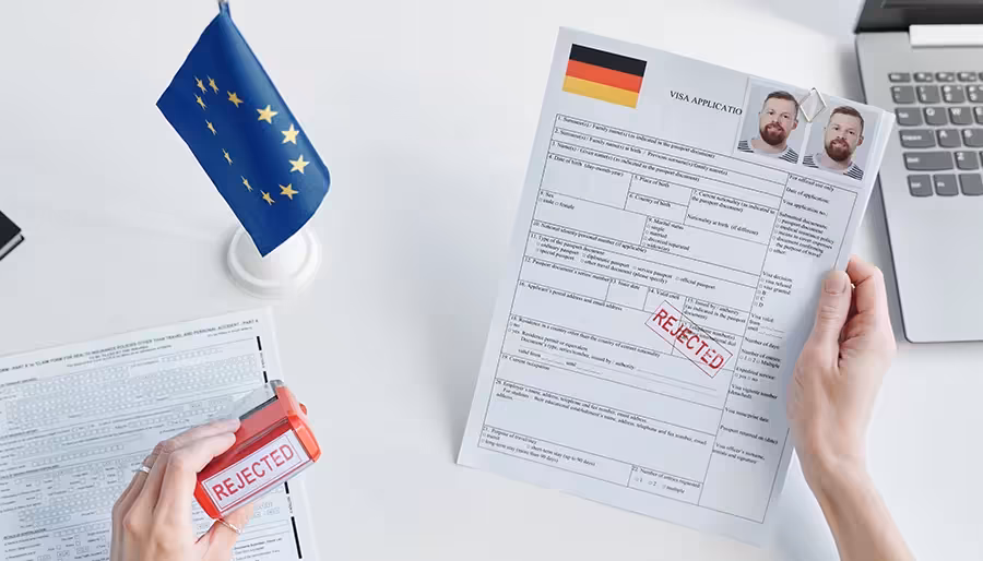Applicant submitting documents for Netherlands Schengen visa Dubai at a visa application center.