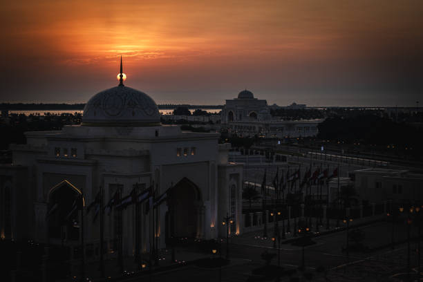 Golden Sunrise and Sunset in Abu Dhabi over city skyline