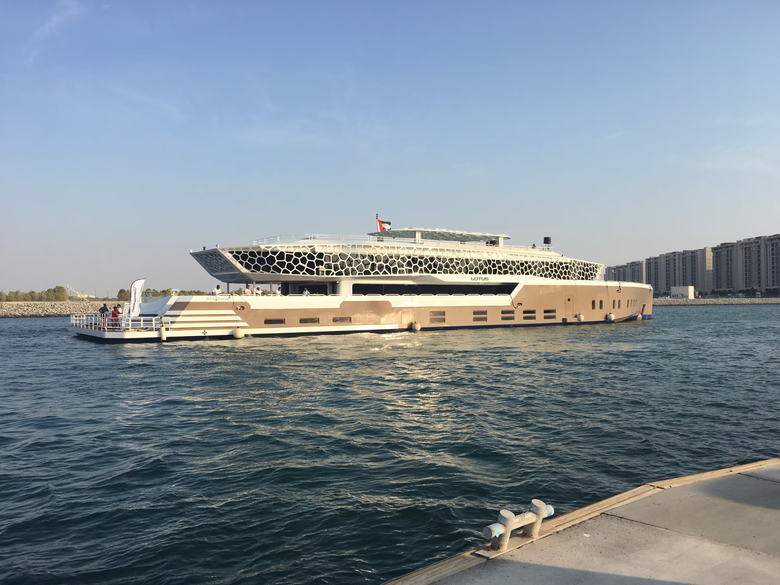 Luxury mega yacht cruise Dubai at sunset in Dubai Marina during a Lotus Marina cruise – showcasing the elegance of a Dubai sunset yacht tour.