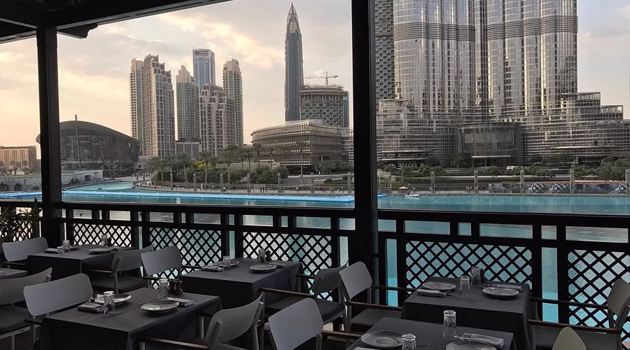 View of The Burj Khalifa towering over Dubai skyline, a must-visit tourist attraction with easy online ticket booking.
