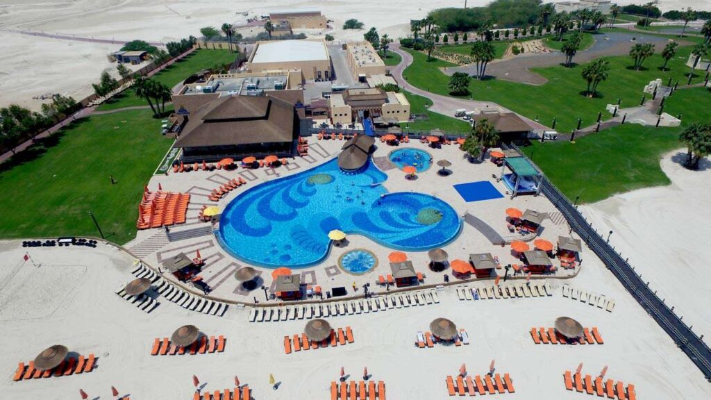 Picnic setup by the beach with skyline view at top Picnic Locations in Abu Dhabi