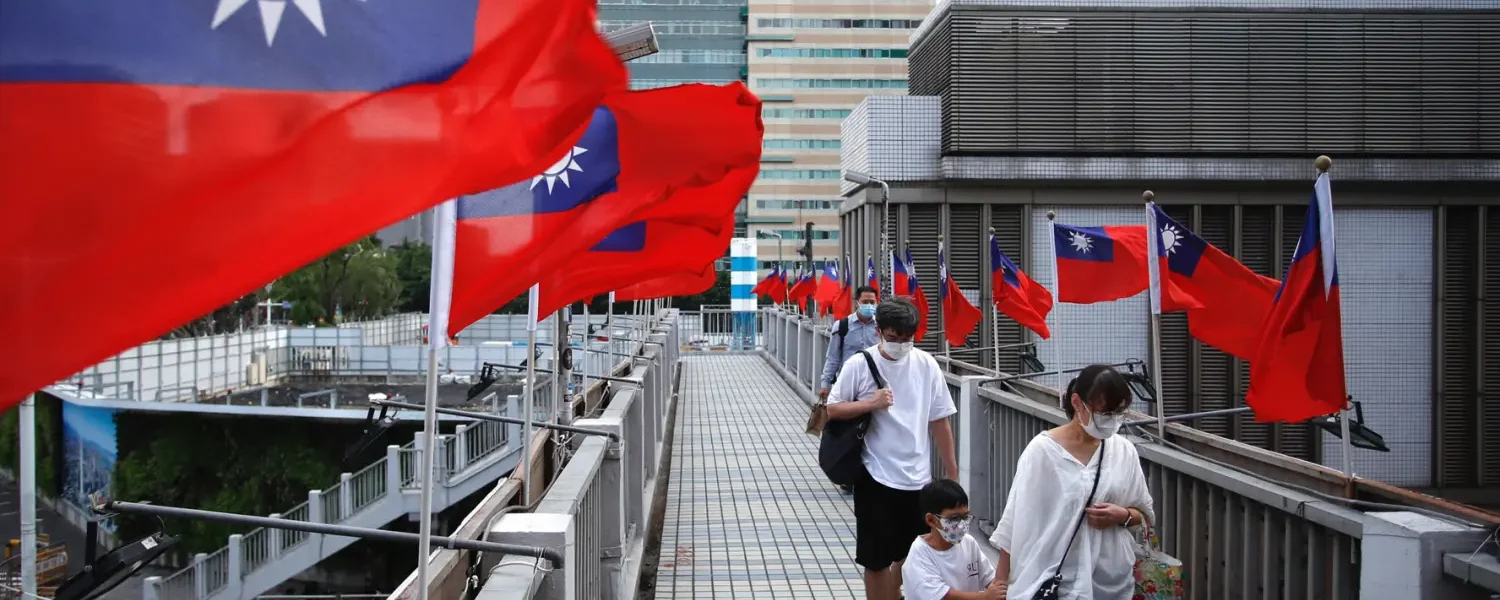 Traveler reviewing documents for visa to Taiwan from Dubai to avoid common Taiwan visa from Dubai application mistakes.