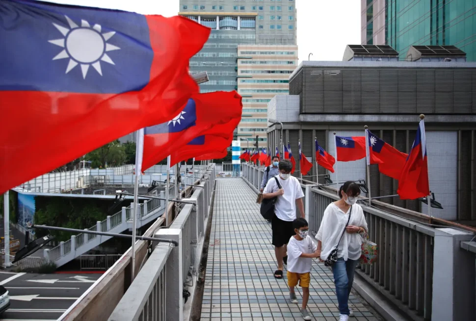 Traveler reviewing documents for visa to Taiwan from Dubai to avoid common Taiwan visa from Dubai application mistakes.