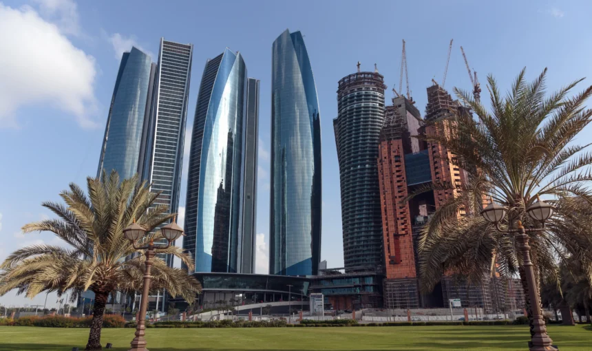 Top 6 Picnic Locations in Abu Dhabi That Are Perfect for Weekend Relaxation › Forever Tourism LLC Picnic setup by the beach with skyline view at top Picnic Locations in Abu Dhabi