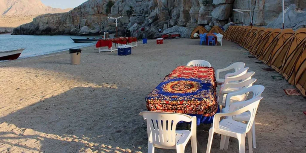 A traditional dhow sailing through Musandam Dibba majestic fjords