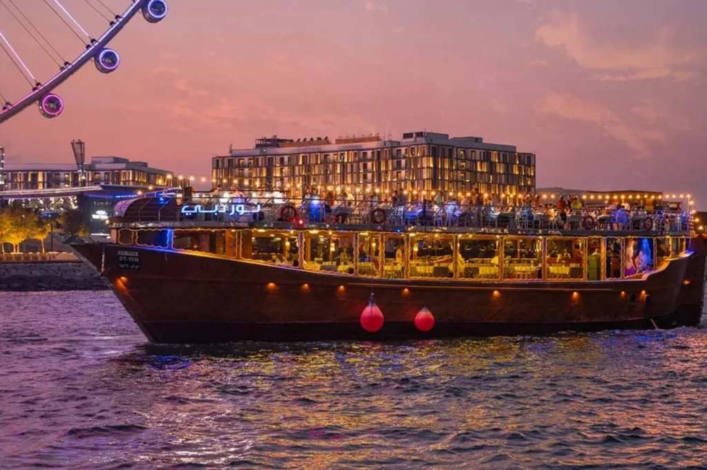 Traditional dhow on Dubai Creek during a sunset creek dhow cruise tour