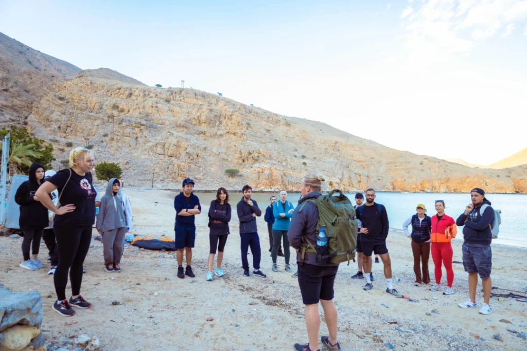 Traditional wooden dhow sailing through Musandam Dibba fjords—Musandam Dibba cruise