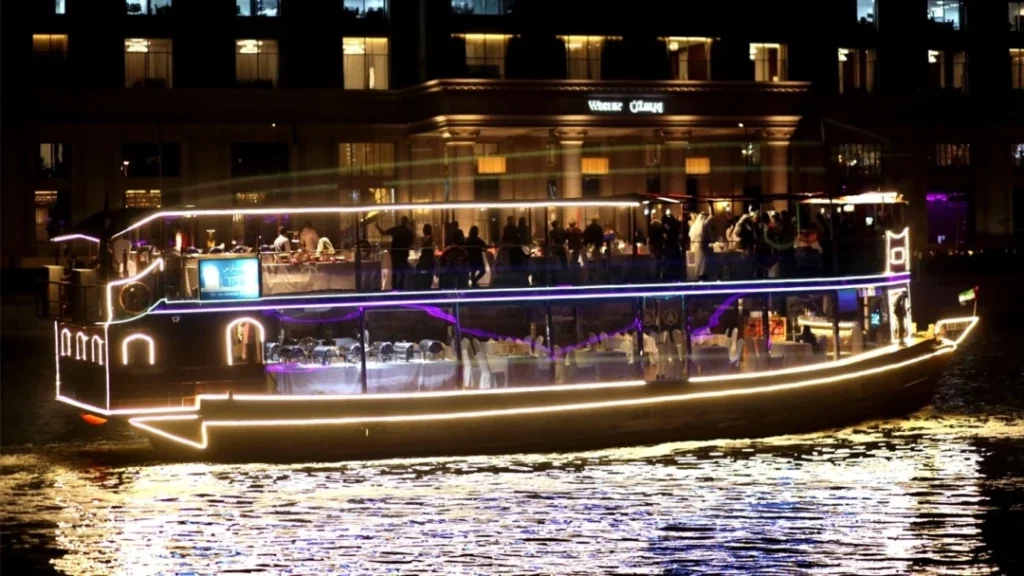 A stunning night view of Dubai Canal Cruise illuminated skyline