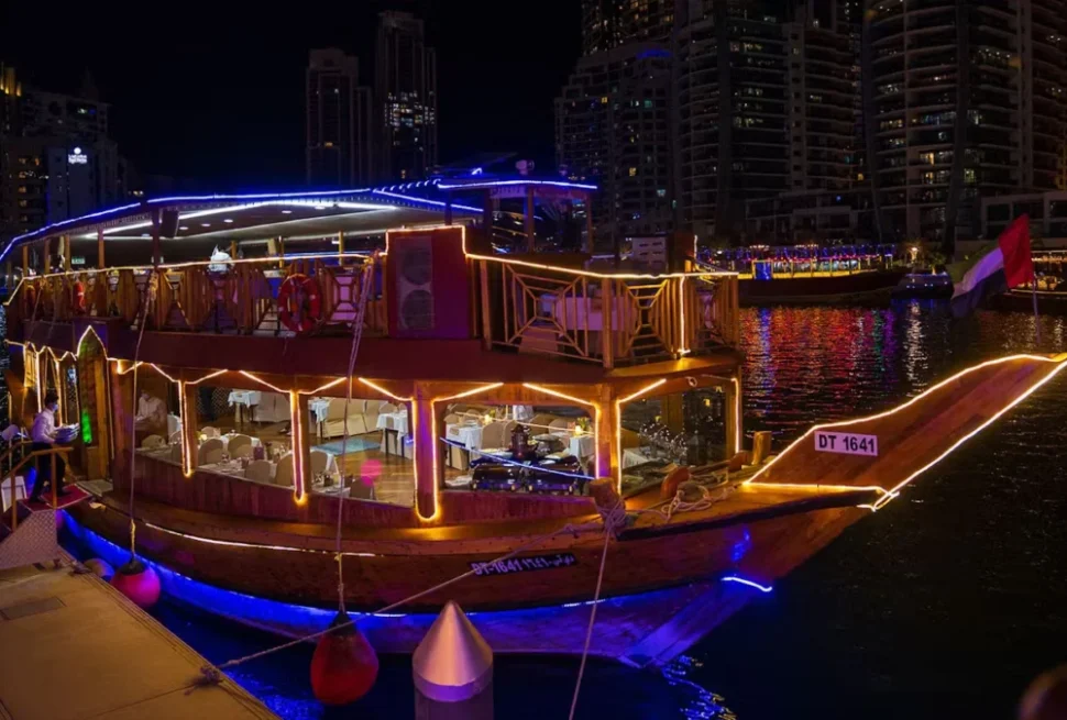 Traditional dhow on Dubai Creek during a sunset creek dhow cruise tour