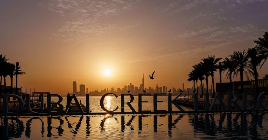 Traditional Dhow Cruise Creek during sunset in Dubai with dining setup