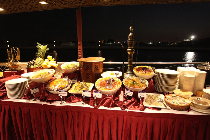 Scenic night capture of Dubai Water Canal Cruise with illuminated skyline