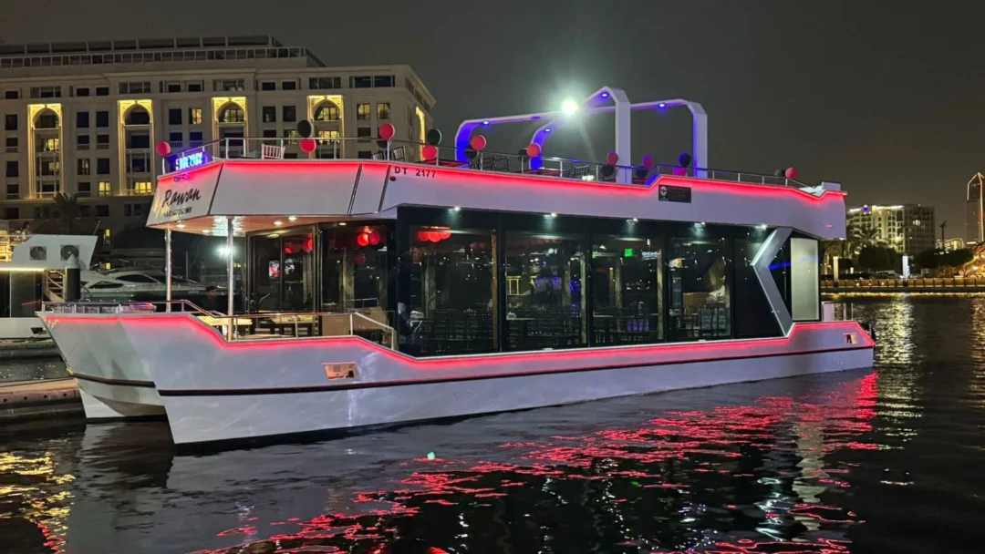 Dubai Luxury Canal Dinner Cruise with skyline view and luxury dhow under lights