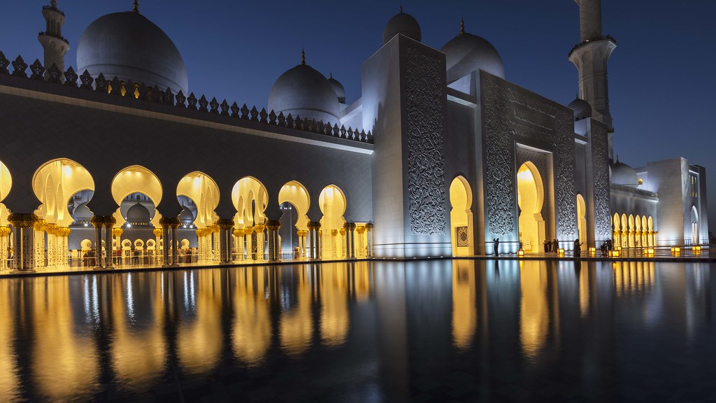 6 Mosques to Visit in the UAE: Stunning Architecture › Forever Tourism LLC Grand domes and marble courtyard at one of the top mosques to visit in the UAE