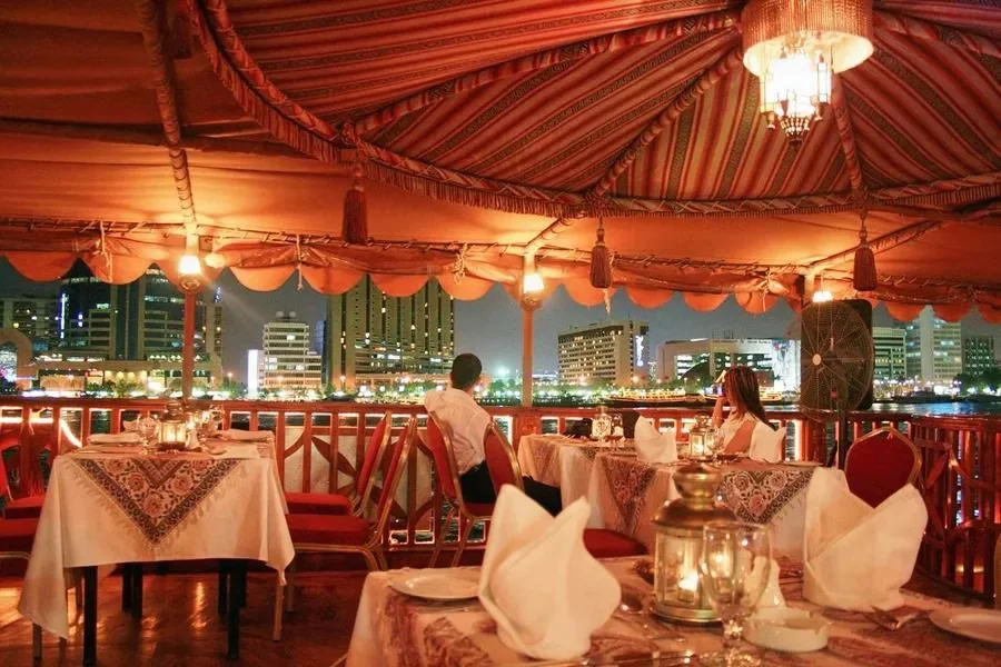 Marina Dhow Cruise With Dinner aboard traditional dhow with Dubai Marina skyline views