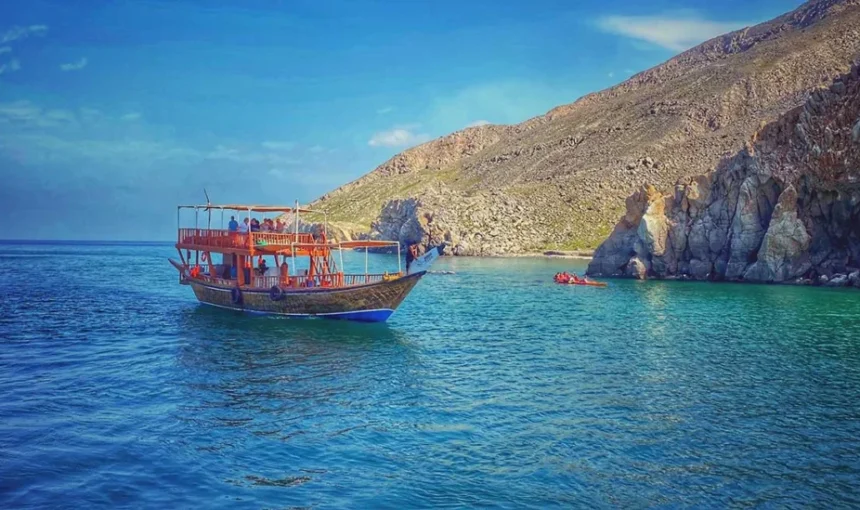 Musandam Dibba Trip | Why Everyone’s Booking Now | #MustCruise2025 › Forever Tourism LLC Traditional dhow sailing on crystal waters during a Musandam Dibba trip