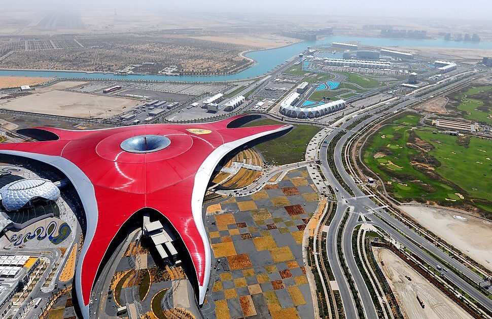 › Forever Tourism LLC Skyline view of Abu Dhabi’s Yas Island with Ferrari World and Yas Marina in the background