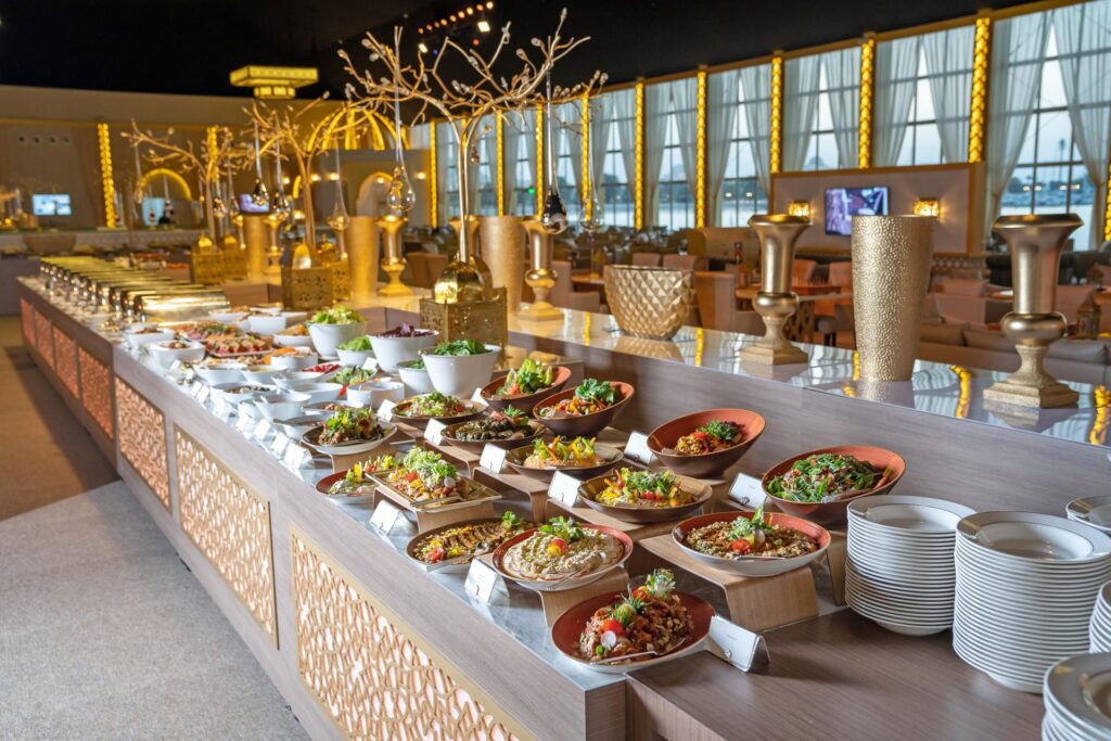 Ramadan in Abu Dhabi – Iftar tent with lanterns, dates, and sunset backdrop