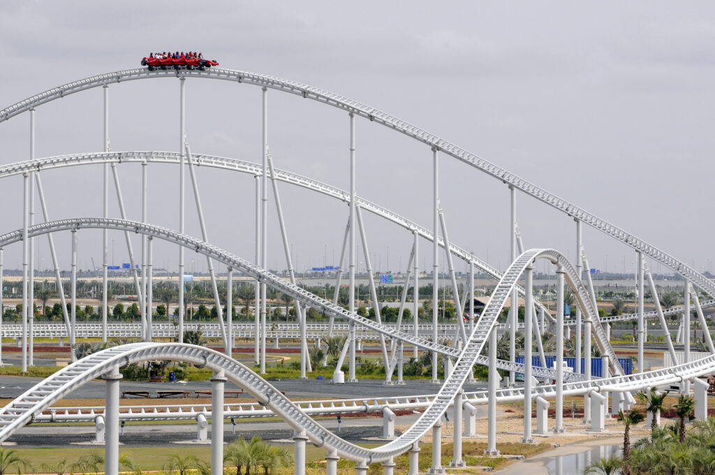 Visitors enjoying Abu Dhabi city tour with Ferrari World thrills, booking with Forever Tourism.