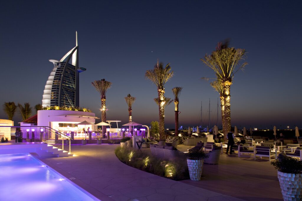 Women enjoying drinks and dancing during Thursday night ladies nights in Dubai, 2025.