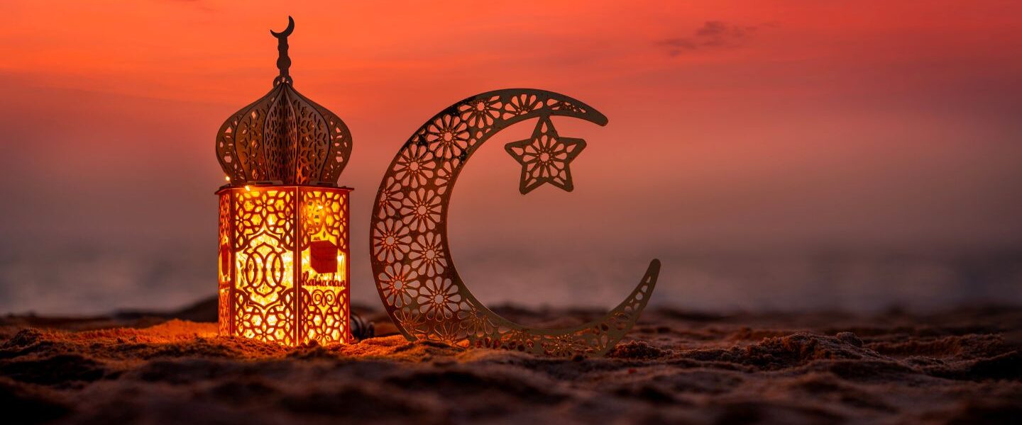 Beautiful Ramadan street scene in Dubai at sunset showing lanterns, traditional decorations, and a festive ambiance