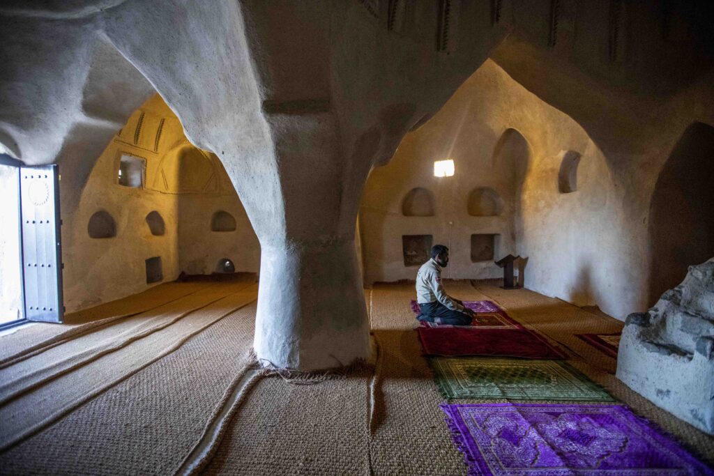 › Forever Tourism LLC Grand domes and marble courtyard at one of the top mosques to visit in the UAE