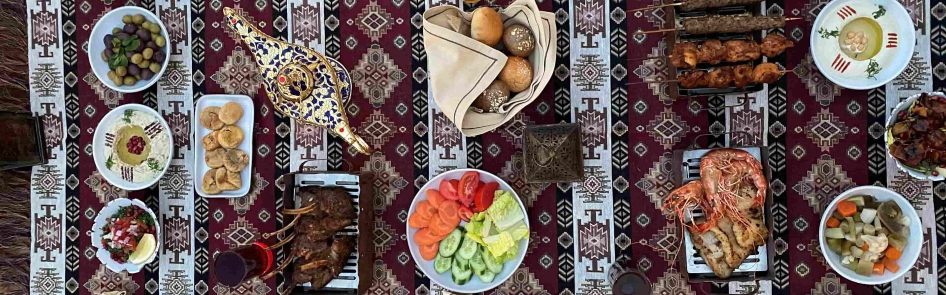 Beautifully decorated Iftar setup in Dubai for Ramadan 2026 with Arabic lamps and dates