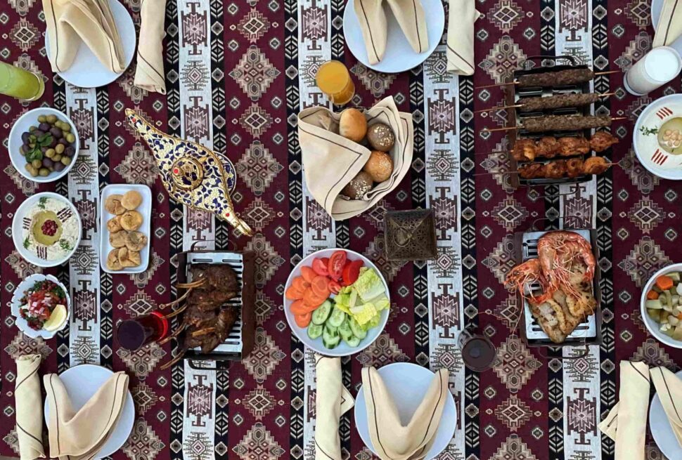 Beautifully decorated Iftar setup in Dubai for Ramadan 2026 with Arabic lamps and dates