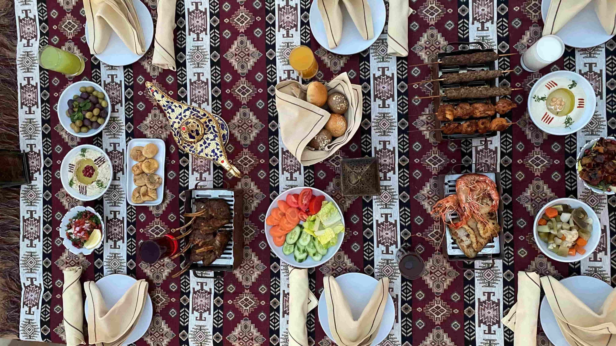 Beautifully decorated Iftar setup in Dubai for Ramadan 2026 with Arabic lamps and dates