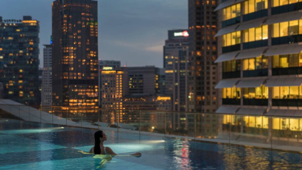 › Forever Tourism LLC Panoramic skyline showcasing Gevora Hotel and Burj Al Arab among the world’s tallest hotels.