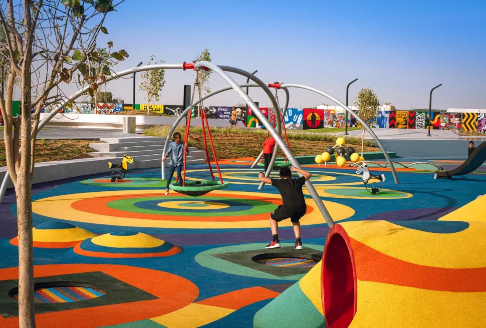 Children playing in top-rated playgrounds for kids in the UAE, surrounded by safe, modern play structures.