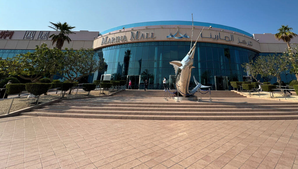 › Forever Tourism LLC Beautiful view of attractions near Abu Dhabi's Louvre Museum including gardens and cultural sites