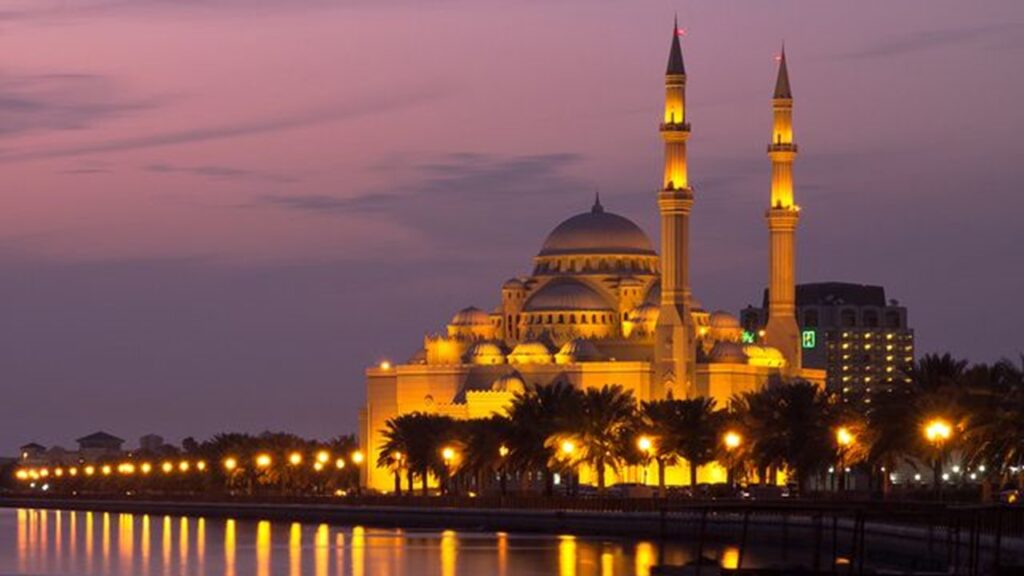 › Forever Tourism LLC Grand domes and marble courtyard at one of the top mosques to visit in the UAE
