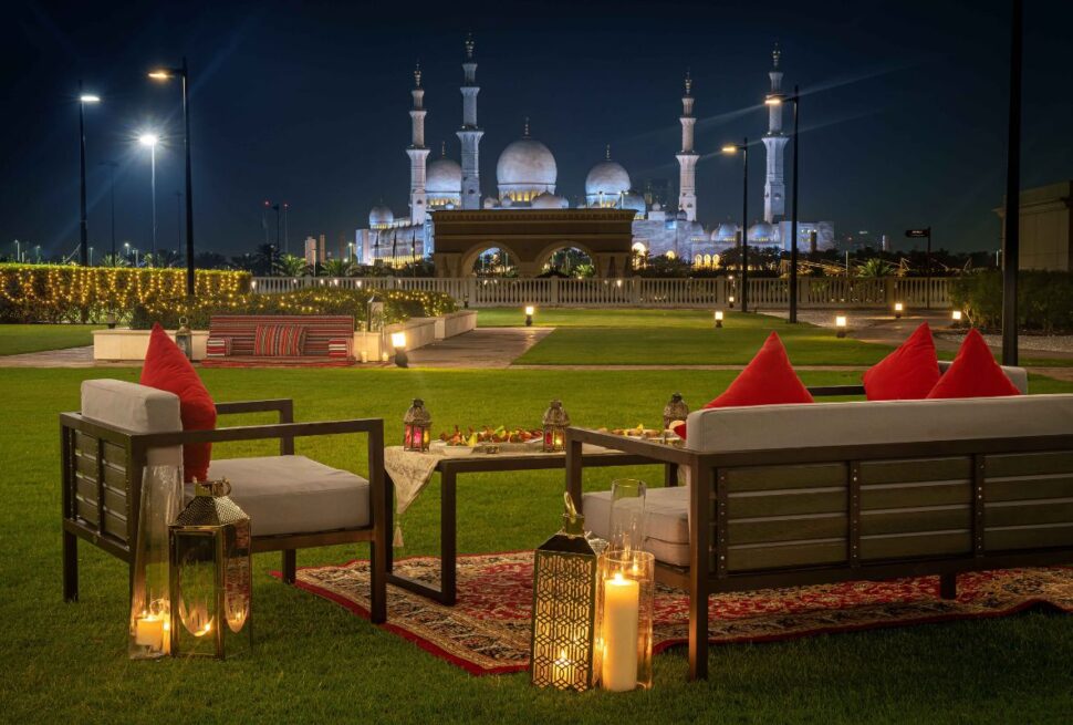 Ramadan in Abu Dhabi – Iftar tent with lanterns, dates, and sunset backdrop