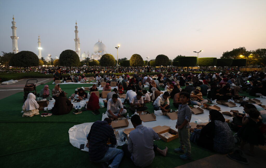 Beautiful Ramadan street scene in Dubai at sunset showing lanterns, traditional decorations, and a festive ambiance