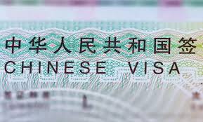 Traveler holding passport during China visa application in Dubai – guide for visa to China from Dubai and China tourist visa from Dubai.