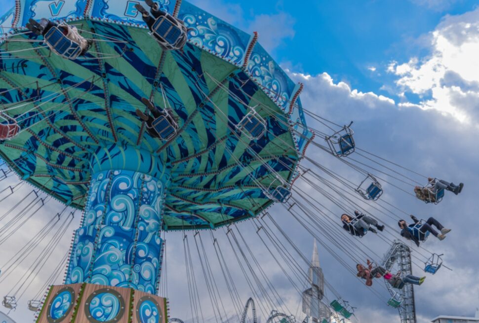 Thrill-seekers enjoying rides at IMG Worlds of Adventure with IMG Park Tickets, including IMG Tickets, IMG World Ticket, and IMG Theme Park Tickets.