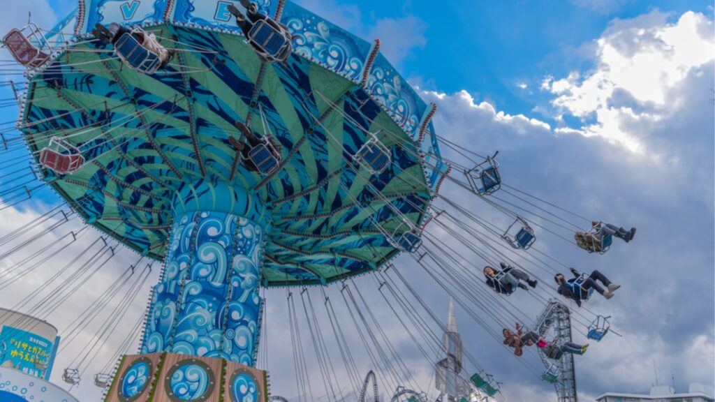 Families enjoying thrilling attractions at IMG Worlds of Adventure with IMG Theme Park Tickets, including IMG Tickets, IMG Park Tickets, and IMG World Ticket.