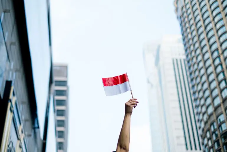 Indonesia Visa | Stuck Again? Use This 3-Step Fix | #Hack › Forever Tourism LLC Traveler holding Indonesia visa at airport before flight from Dubai to Indonesia