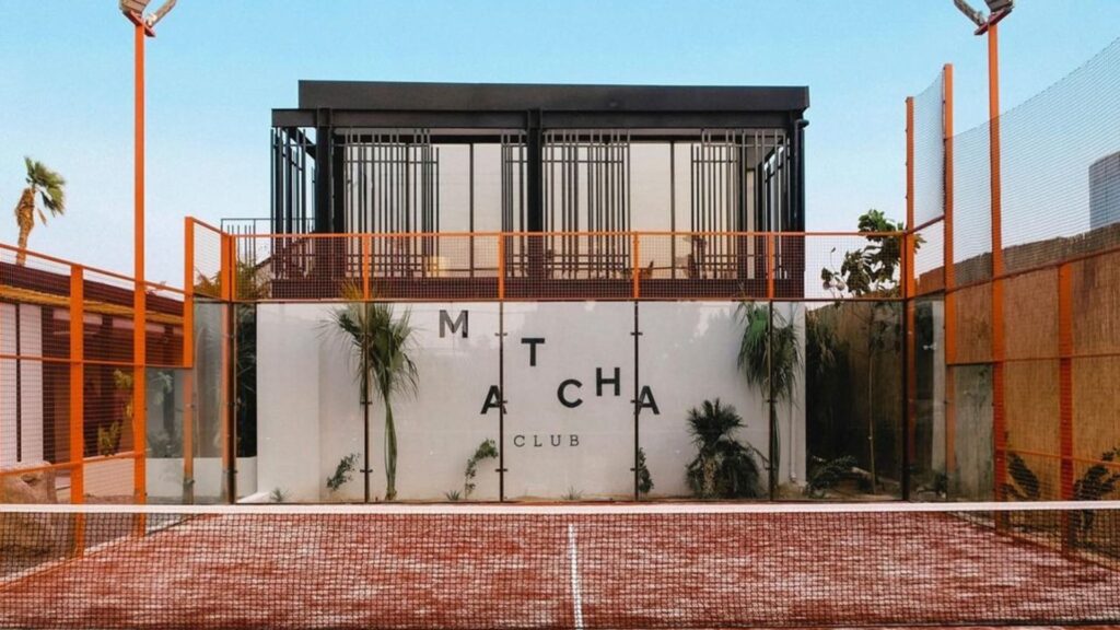 Modern outdoor Padel Tennis courts in Dubai with skyline in the background